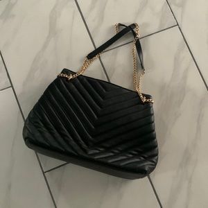 Black purse. “A new day” purse